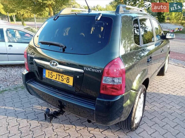 Зеленый Хендай Туксон, объемом двигателя 2 л и пробегом 183 тыс. км за 8900 $, фото 13 на Automoto.ua
