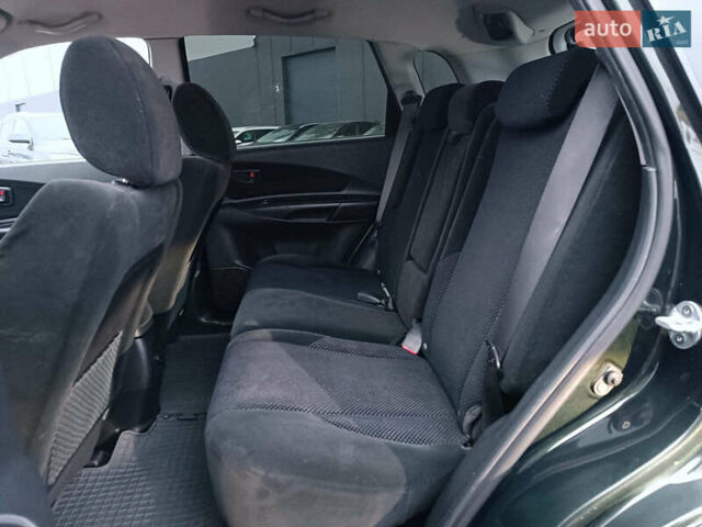 Зеленый Хендай Туксон, объемом двигателя 2 л и пробегом 223 тыс. км за 7290 $, фото 30 на Automoto.ua