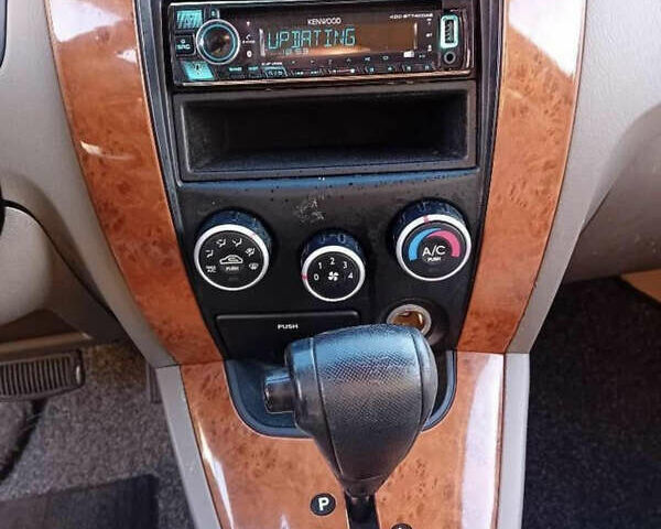 Зеленый Хендай Туксон, объемом двигателя 2 л и пробегом 183 тыс. км за 8900 $, фото 10 на Automoto.ua