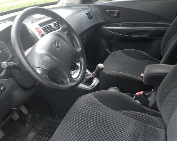 Зелений Хендай Туксон, об'ємом двигуна 1.99 л та пробігом 281 тис. км за 8500 $, фото 12 на Automoto.ua