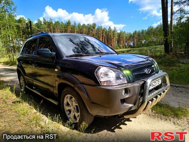 Зеленый Хендай Туксон, объемом двигателя 2 л и пробегом 190 тыс. км за 8500 $, фото 3 на Automoto.ua