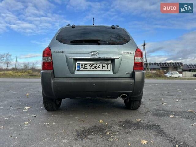 Зеленый Хендай Туксон, объемом двигателя 1.98 л и пробегом 168 тыс. км за 8800 $, фото 31 на Automoto.ua