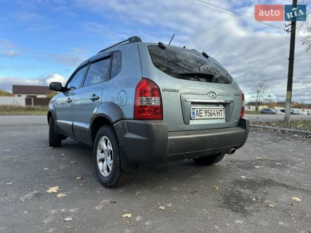 Зеленый Хендай Туксон, объемом двигателя 1.98 л и пробегом 168 тыс. км за 8800 $, фото 35 на Automoto.ua