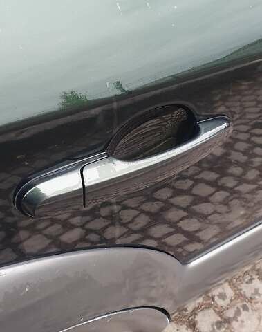 Зеленый Хендай Туксон, объемом двигателя 2 л и пробегом 115 тыс. км за 8500 $, фото 19 на Automoto.ua