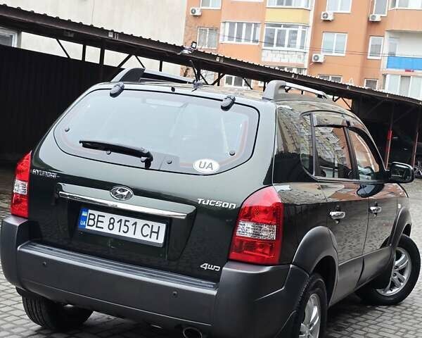 Зеленый Хендай Туксон, объемом двигателя 1.98 л и пробегом 178 тыс. км за 8900 $, фото 17 на Automoto.ua