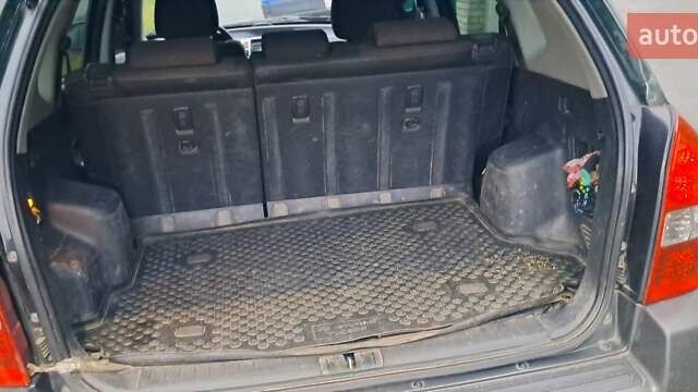 Зелений Хендай Туксон, об'ємом двигуна 1.98 л та пробігом 294 тис. км за 5500 $, фото 7 на Automoto.ua