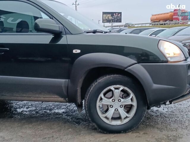 Зеленый Хендай Туксон, объемом двигателя 2 л и пробегом 223 тыс. км за 7290 $, фото 12 на Automoto.ua