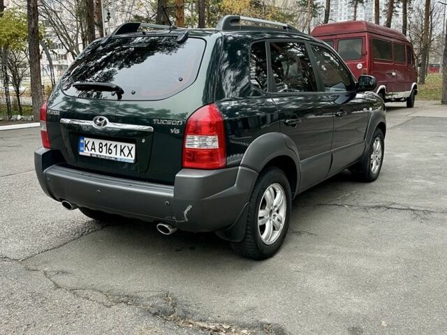 Зеленый Хендай Туксон, объемом двигателя 2.7 л и пробегом 201 тыс. км за 8400 $, фото 4 на Automoto.ua