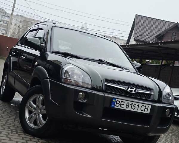 Зеленый Хендай Туксон, объемом двигателя 1.98 л и пробегом 178 тыс. км за 8900 $, фото 1 на Automoto.ua