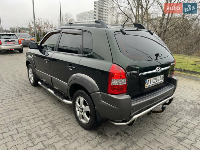 Зеленый Хендай Туксон, объемом двигателя 1.98 л и пробегом 295 тыс. км за 5950 $, фото 32 на Automoto.ua