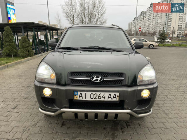 Зеленый Хендай Туксон, объемом двигателя 1.98 л и пробегом 295 тыс. км за 5950 $, фото 11 на Automoto.ua