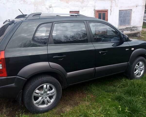 Зелений Хендай Туксон, об'ємом двигуна 1.99 л та пробігом 281 тис. км за 8500 $, фото 7 на Automoto.ua