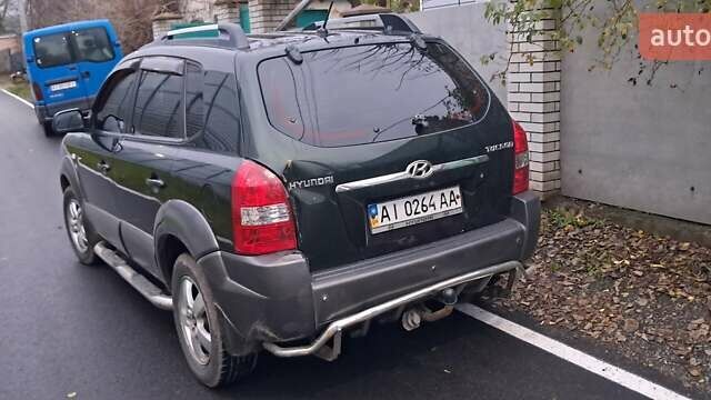 Зелений Хендай Туксон, об'ємом двигуна 1.98 л та пробігом 294 тис. км за 5500 $, фото 2 на Automoto.ua