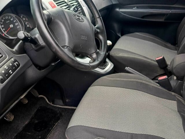 Зеленый Хендай Туксон, объемом двигателя 2 л и пробегом 108 тыс. км за 8750 $, фото 1 на Automoto.ua