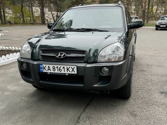 Зеленый Хендай Туксон, объемом двигателя 2.7 л и пробегом 201 тыс. км за 8400 $, фото 2 на Automoto.ua