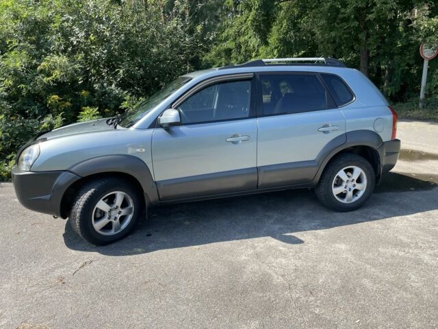 Зеленый Хендай Туксон, объемом двигателя 2 л и пробегом 130 тыс. км за 9100 $, фото 1 на Automoto.ua