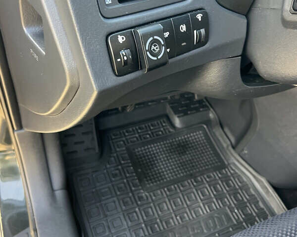 Зеленый Хендай Туксон, объемом двигателя 1.98 л и пробегом 130 тыс. км за 9100 $, фото 16 на Automoto.ua