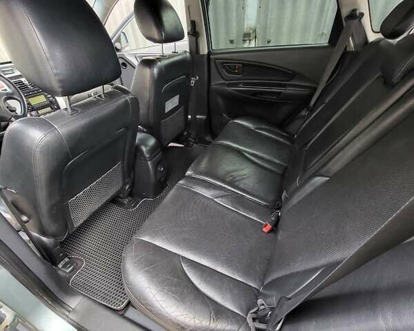 Зеленый Хендай Туксон, объемом двигателя 2.66 л и пробегом 166 тыс. км за 8500 $, фото 8 на Automoto.ua