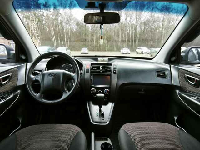 Зеленый Хендай Туксон, объемом двигателя 2 л и пробегом 275 тыс. км за 7999 $, фото 3 на Automoto.ua