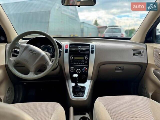 Зеленый Хендай Туксон, объемом двигателя 2 л и пробегом 302 тыс. км за 6990 $, фото 21 на Automoto.ua