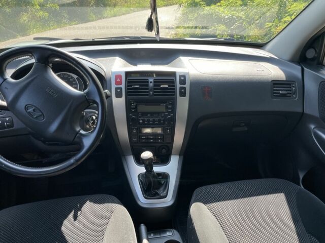 Зеленый Хендай Туксон, объемом двигателя 2 л и пробегом 130 тыс. км за 9100 $, фото 7 на Automoto.ua