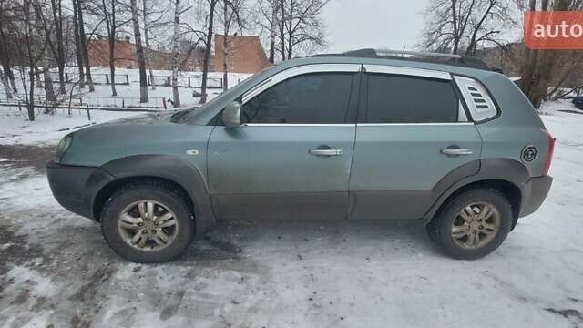 Зелений Хендай Туксон, об'ємом двигуна 2 л та пробігом 160 тис. км за 7800 $, фото 1 на Automoto.ua