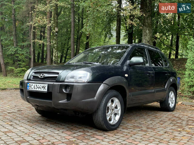 Зеленый Хендай Туксон, объемом двигателя 1.98 л и пробегом 230 тыс. км за 7999 $, фото 13 на Automoto.ua