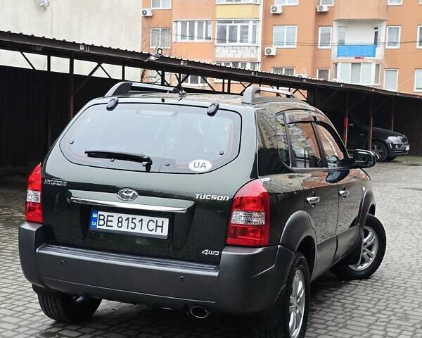 Зеленый Хендай Туксон, объемом двигателя 1.98 л и пробегом 178 тыс. км за 8900 $, фото 11 на Automoto.ua