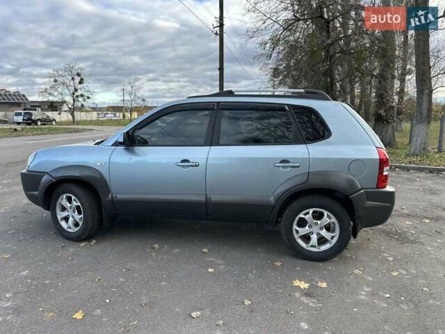 Зеленый Хендай Туксон, объемом двигателя 1.98 л и пробегом 168 тыс. км за 8800 $, фото 24 на Automoto.ua