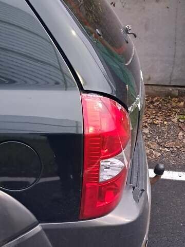 Зелений Хендай Туксон, об'ємом двигуна 1.98 л та пробігом 294 тис. км за 5500 $, фото 5 на Automoto.ua