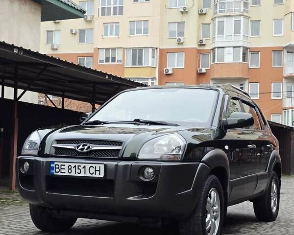 Зеленый Хендай Туксон, объемом двигателя 1.98 л и пробегом 178 тыс. км за 8900 $, фото 47 на Automoto.ua