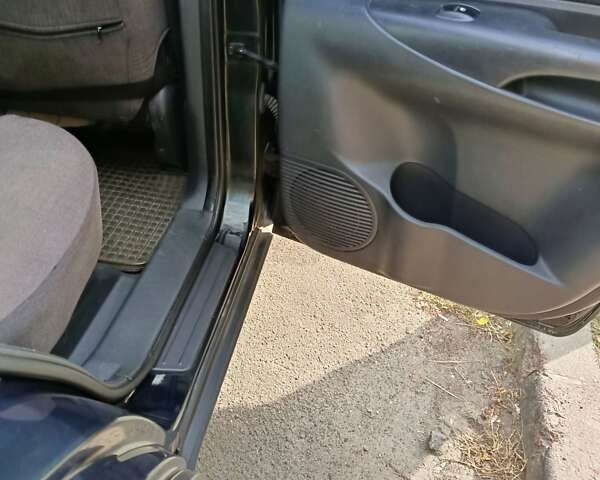 Зеленый Хендай Туксон, объемом двигателя 2 л и пробегом 140 тыс. км за 8800 $, фото 12 на Automoto.ua