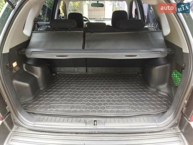 Зелений Хендай Туксон, об'ємом двигуна 2 л та пробігом 94 тис. км за 9000 $, фото 7 на Automoto.ua