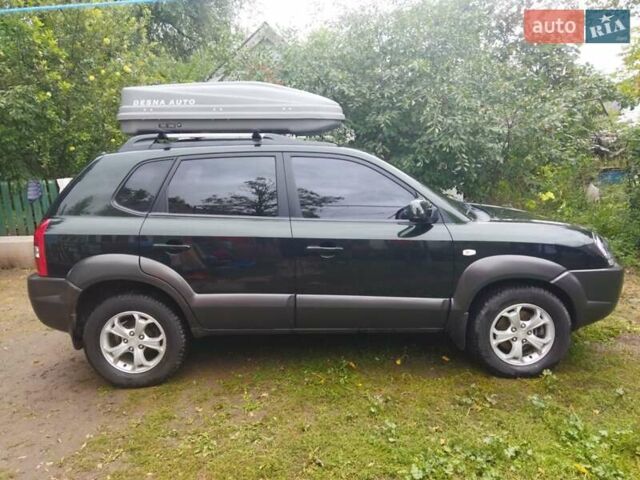 Зелений Хендай Туксон, об'ємом двигуна 2 л та пробігом 94 тис. км за 9000 $, фото 4 на Automoto.ua