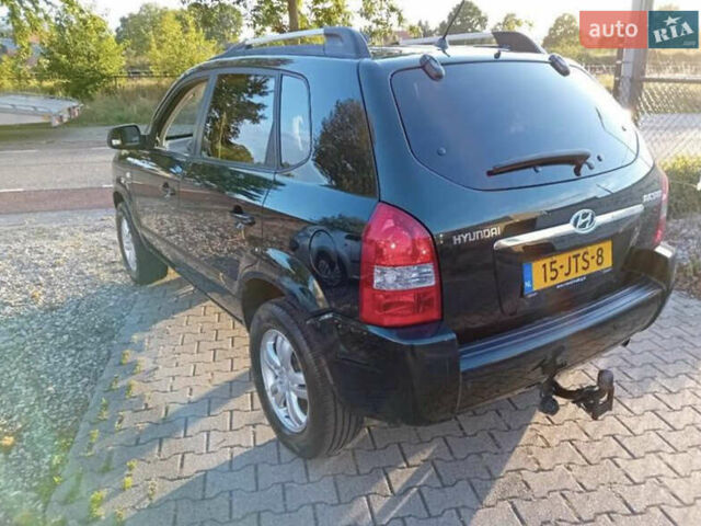 Зеленый Хендай Туксон, объемом двигателя 2 л и пробегом 183 тыс. км за 8900 $, фото 6 на Automoto.ua