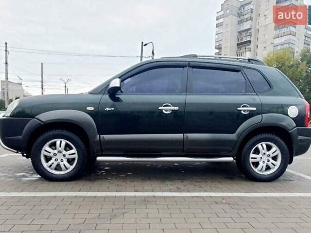 Зеленый Хендай Туксон, объемом двигателя 2 л и пробегом 203 тыс. км за 7500 $, фото 6 на Automoto.ua