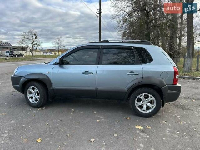 Зеленый Хендай Туксон, объемом двигателя 1.98 л и пробегом 168 тыс. км за 8800 $, фото 13 на Automoto.ua