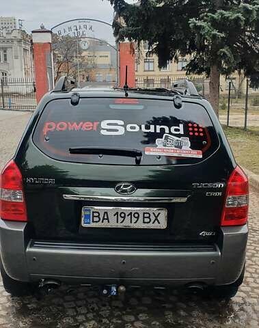 Зеленый Хендай Туксон, объемом двигателя 2 л и пробегом 115 тыс. км за 8500 $, фото 4 на Automoto.ua