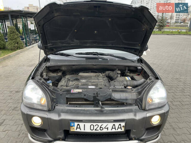 Зеленый Хендай Туксон, объемом двигателя 1.98 л и пробегом 295 тыс. км за 5950 $, фото 33 на Automoto.ua