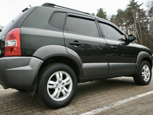 Зеленый Хендай Туксон, объемом двигателя 2 л и пробегом 275 тыс. км за 7999 $, фото 1 на Automoto.ua