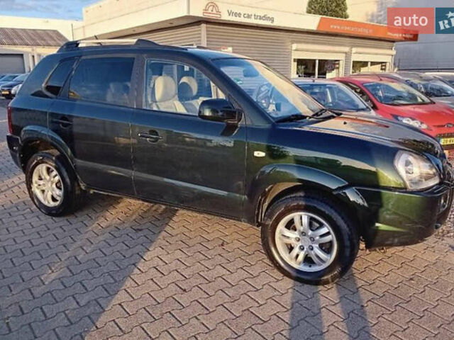 Зеленый Хендай Туксон, объемом двигателя 2 л и пробегом 183 тыс. км за 8900 $, фото 5 на Automoto.ua