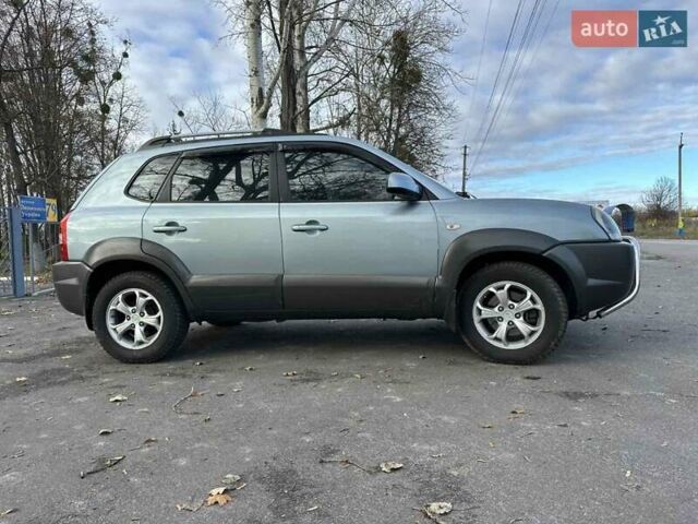Зеленый Хендай Туксон, объемом двигателя 1.98 л и пробегом 168 тыс. км за 8800 $, фото 3 на Automoto.ua