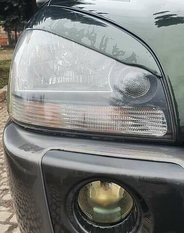 Зеленый Хендай Туксон, объемом двигателя 2 л и пробегом 115 тыс. км за 8500 $, фото 21 на Automoto.ua