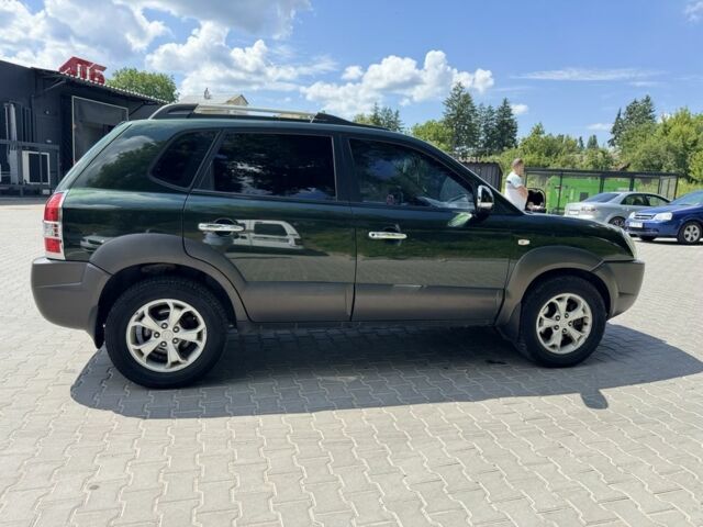 Зеленый Хендай Туксон, объемом двигателя 2.7 л и пробегом 200 тыс. км за 8500 $, фото 1 на Automoto.ua