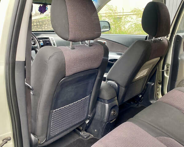 Зелений Хендай Туксон, об'ємом двигуна 2 л та пробігом 129 тис. км за 8750 $, фото 10 на Automoto.ua