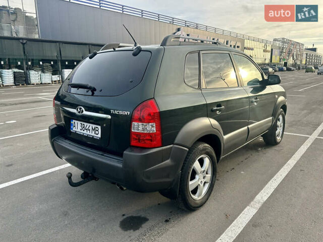 Зелений Хендай Туксон, об'ємом двигуна 1.98 л та пробігом 156 тис. км за 7999 $, фото 4 на Automoto.ua