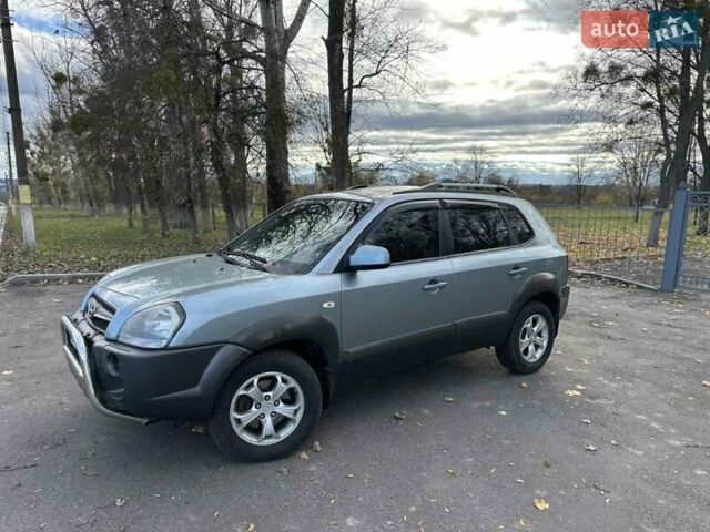 Зеленый Хендай Туксон, объемом двигателя 1.98 л и пробегом 168 тыс. км за 8800 $, фото 14 на Automoto.ua