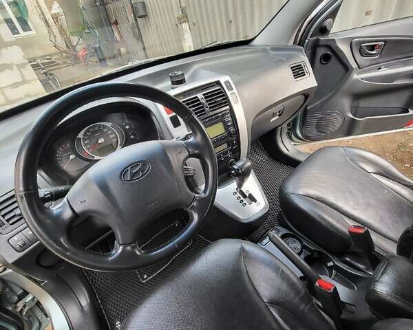 Зеленый Хендай Туксон, объемом двигателя 2.66 л и пробегом 166 тыс. км за 8500 $, фото 3 на Automoto.ua