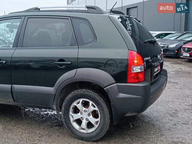 Зеленый Хендай Туксон, объемом двигателя 2 л и пробегом 223 тыс. км за 7290 $, фото 7 на Automoto.ua