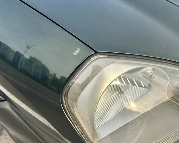 Зелений Хендай Туксон, об'ємом двигуна 1.98 л та пробігом 156 тис. км за 7999 $, фото 8 на Automoto.ua